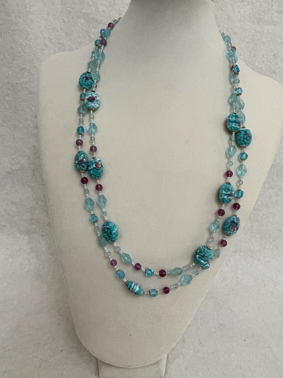 Aqua Necklace 26″ 20mm floral beads and variety of beads separated by seed beads