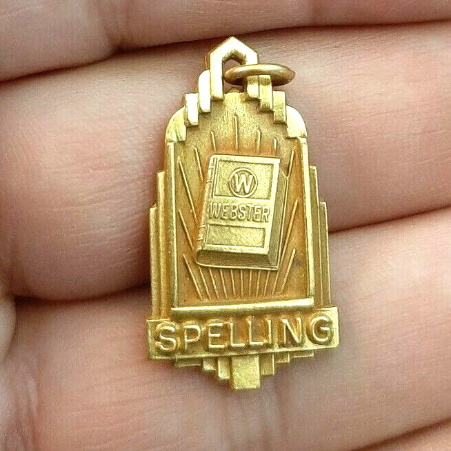 Websters Spelling Metal Pendant Gold color 1″ long Award Education Collectible