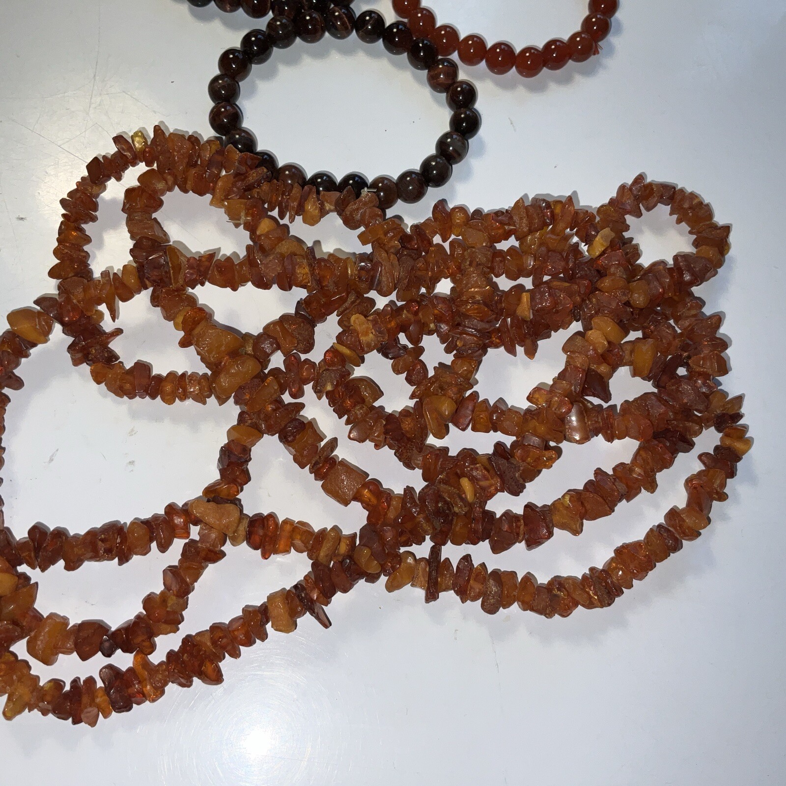 4 Gemstone Bracelets Agate Tiger Eye Carnelian And 70” Amber Necklace