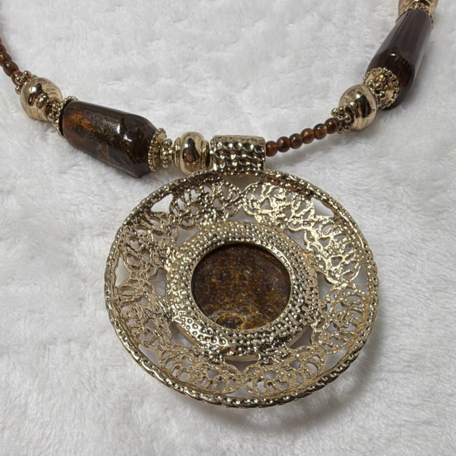 Handcrafted Beaded Statement Necklace Brown Gold Round Pendant Metal Resin