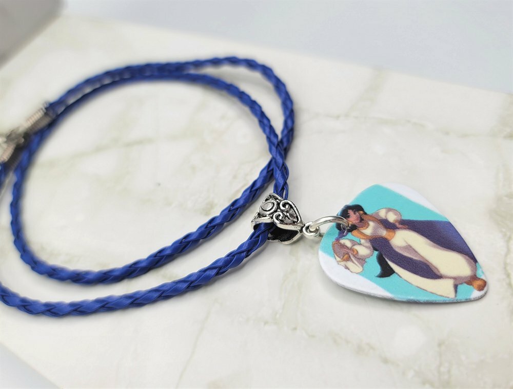 Aladdin’s Jasmine Guitar Pick Necklace on Blue Braided Cord