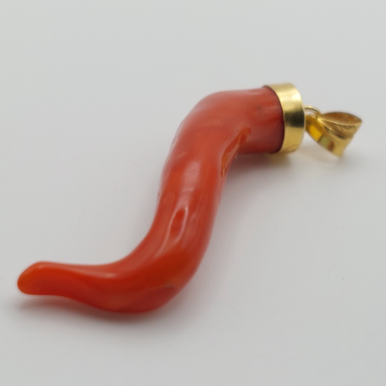 Red natural coral horn pendant, gold plated silver. Good luck charm