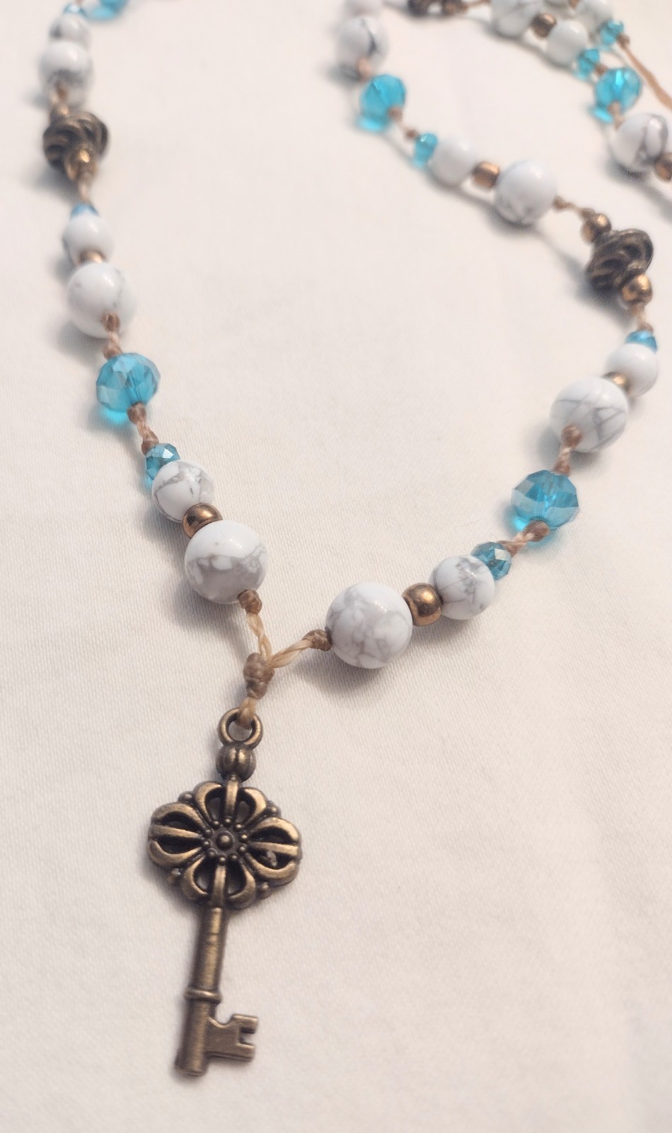 Howlite Necklace w/ Bronze Key Charm. Specify Length, Clasp is added.