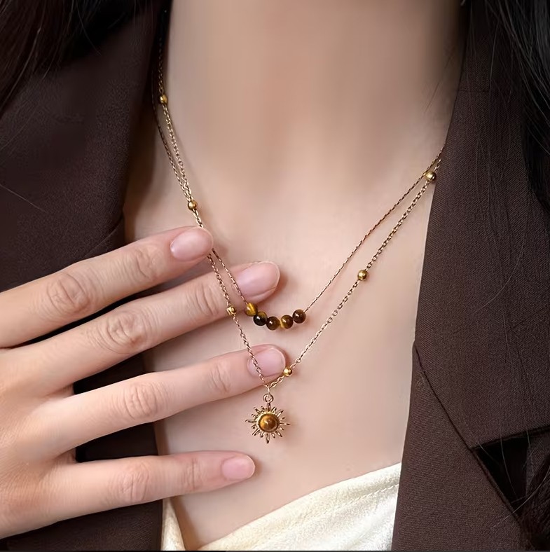 Double Chain Fancy Necklace In Gold Steel With Marbled Beads And Sun Pendant