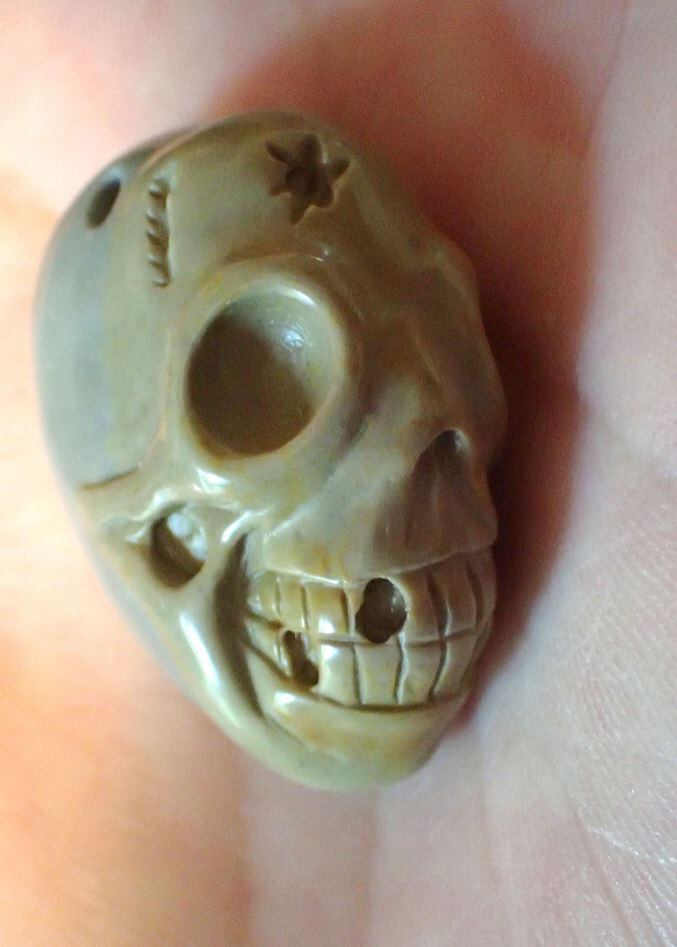 Carved Skull Natural Succor Creek Jasper Pendant
