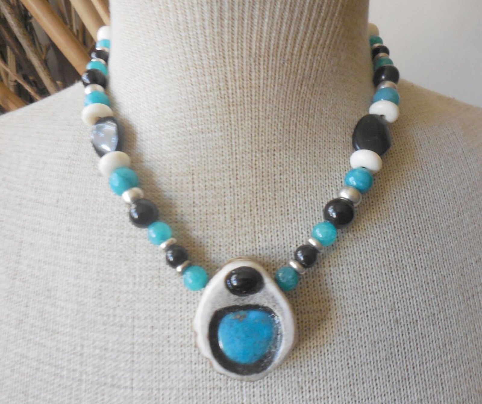 Amulet with Carved Triskelion Turquoise Onyx Cruelty Free Antler Gemstone Beads