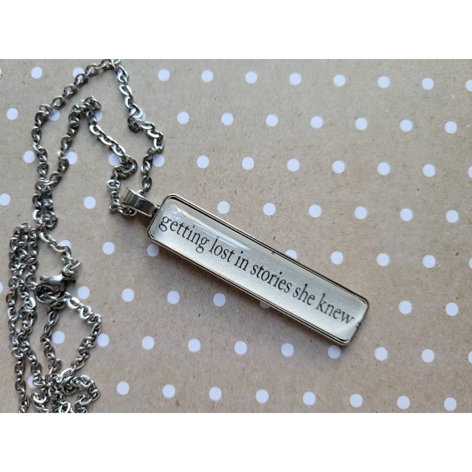 Get Lost in Stories pendant necklace made with Last Chance Library book pages