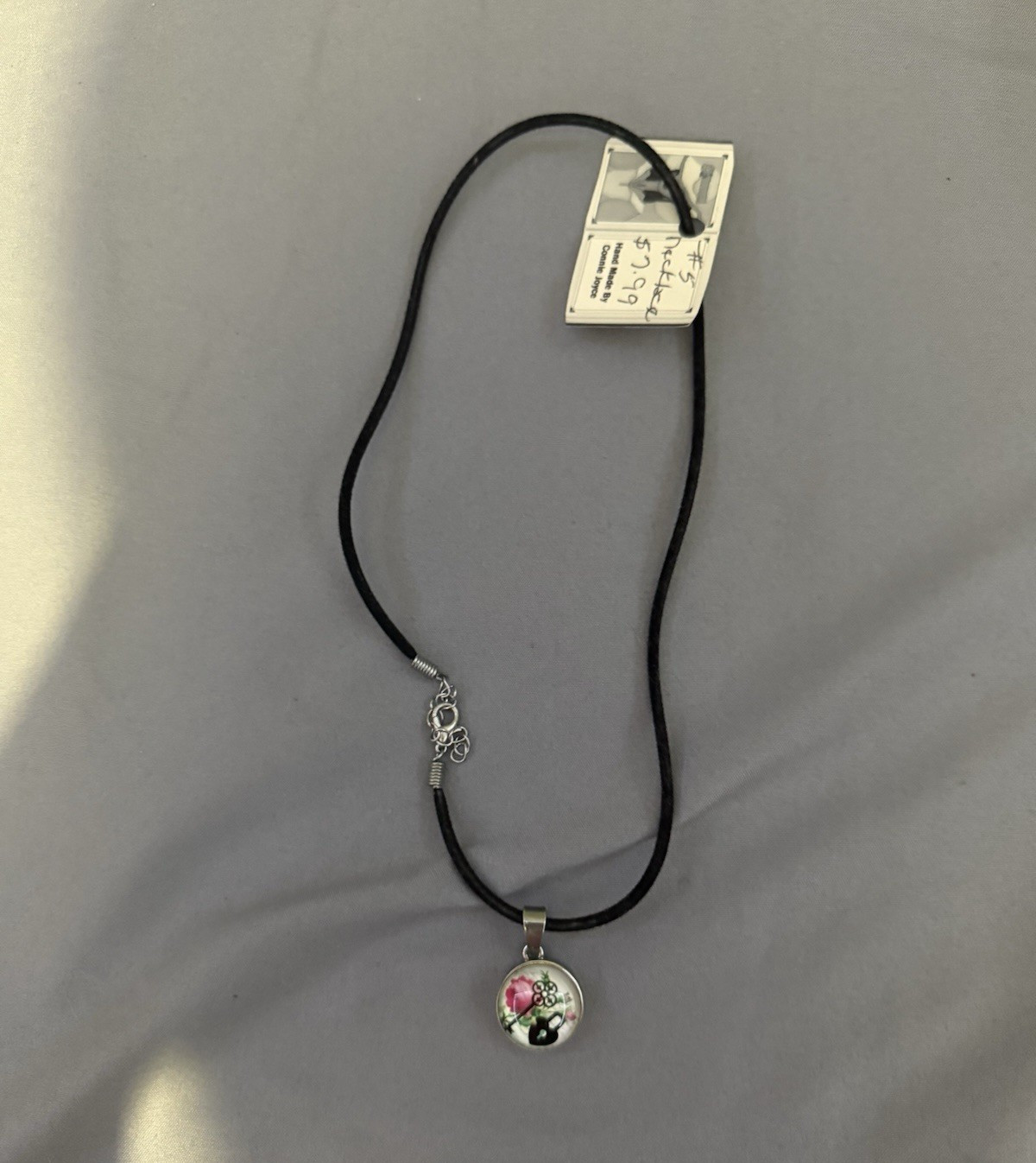Connie Joyce Signed Black Cord Necklace Round Floral Charm Pendant Lobster