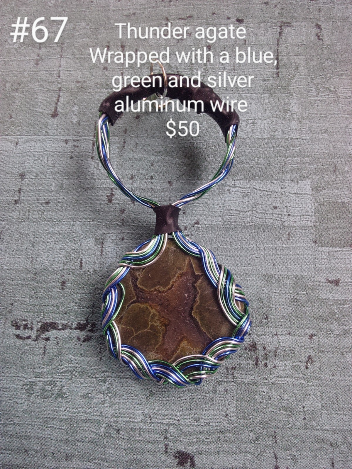 Thunder Agate Stone Pendant Wrapped In Blue Green And Silver Aluminum Wire
