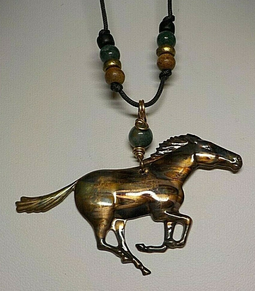 PHOENIX DESIGNS COPPER/BRASS ENAMELED HORSE DESIGN PENDANT ON CORD