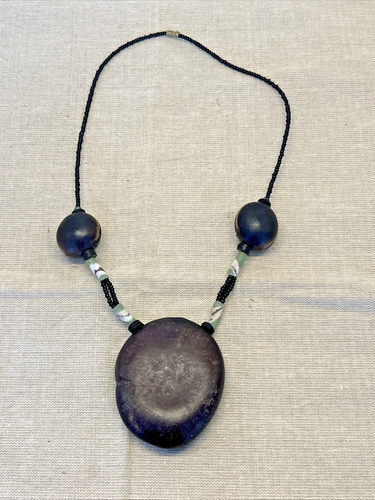 handmade boho-style natural seeds & artisanal clay beads necklace 18″