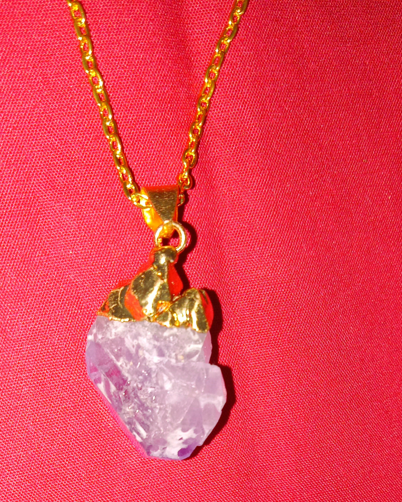 Natural amethyst crystal pendant, gold dipped pendant, on a 22″ goldplated chain