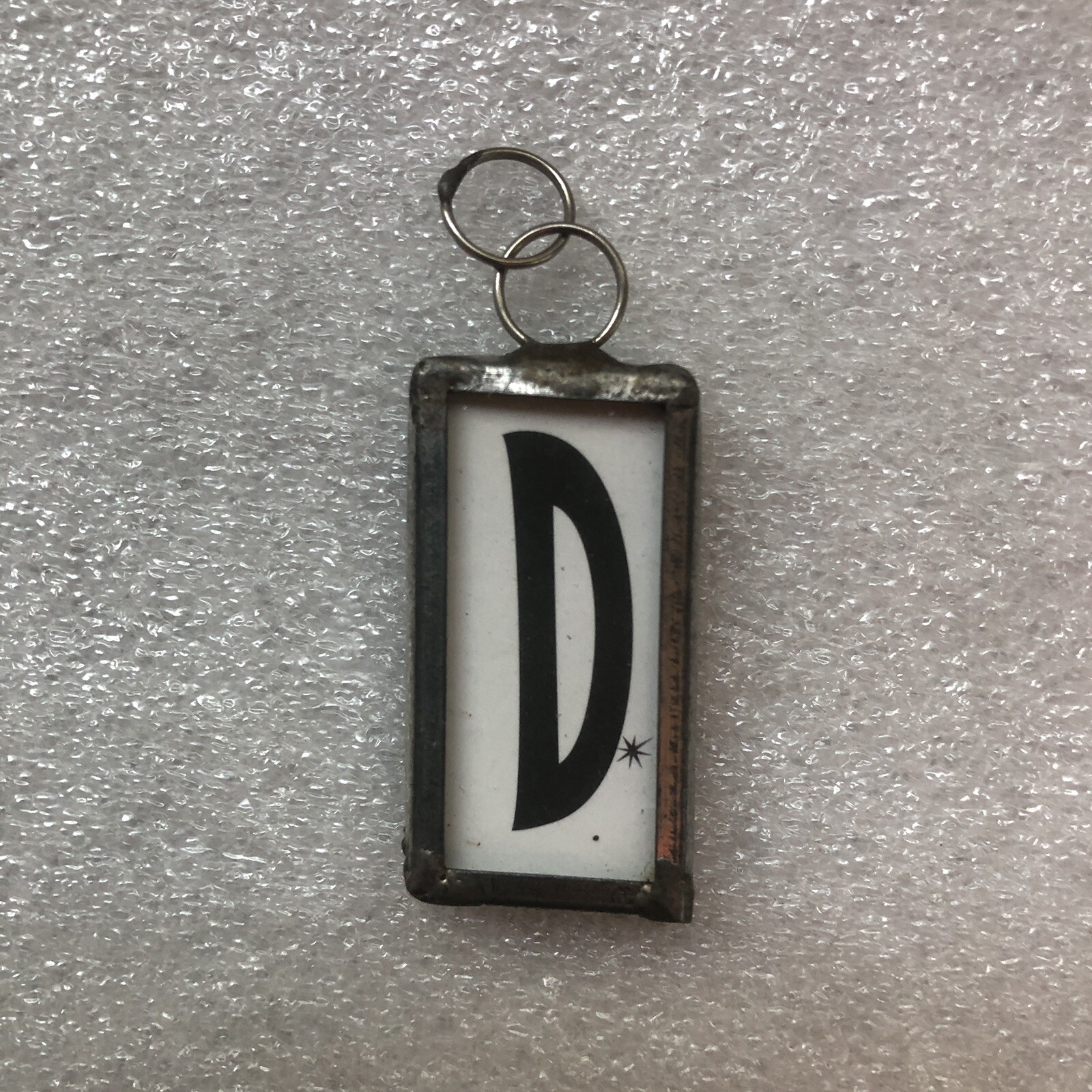 Handmade Reversible Soldered Pewter Charm Pendant “World Famous” 5/8”x 1-1/4”