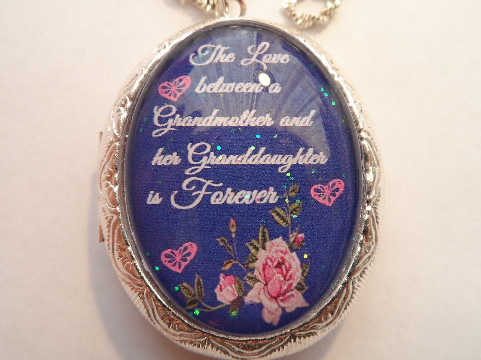THE LOVE BETWEEN A GRANDMOTHER AND GRANDDAUGHTER IS FOREVER- BLUE– LOCKET
