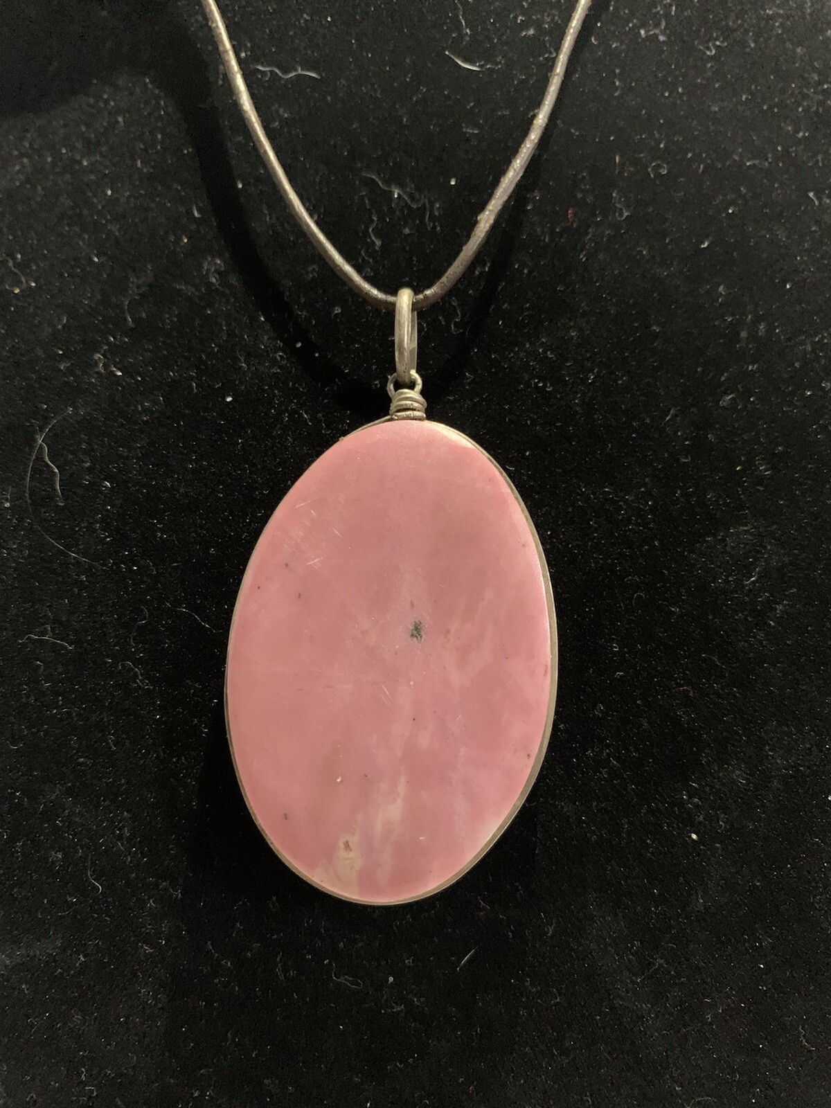Rhodonite Pendant with Silver Accent On Leather String