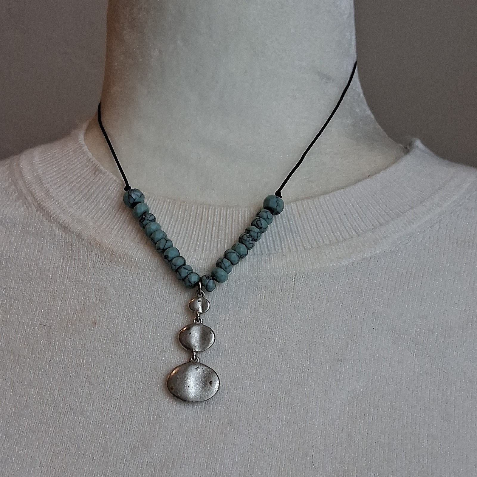 Handcrafted Beaded Necklace with Blue Stone Pendant, Silver Charm, Black Cord