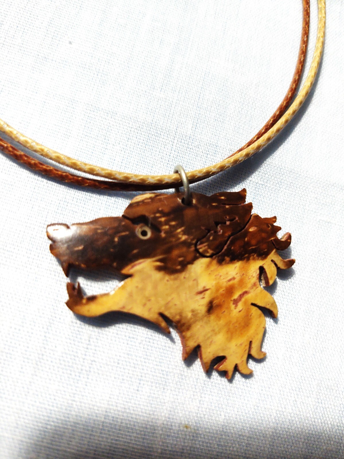 WOLF HEAD CUT OUT HALF AND HALF LIGHT TAN BROWN COCONUT SHELL PENDANT NECKLACE