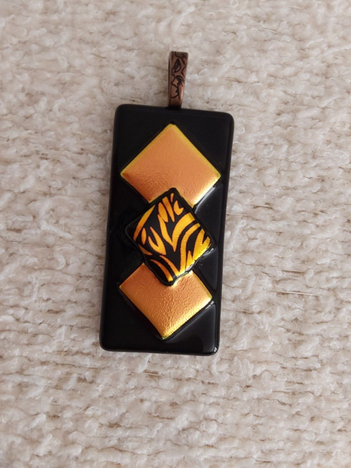 Art Glass Copper on Black Oblong Pendent. Size 1×2