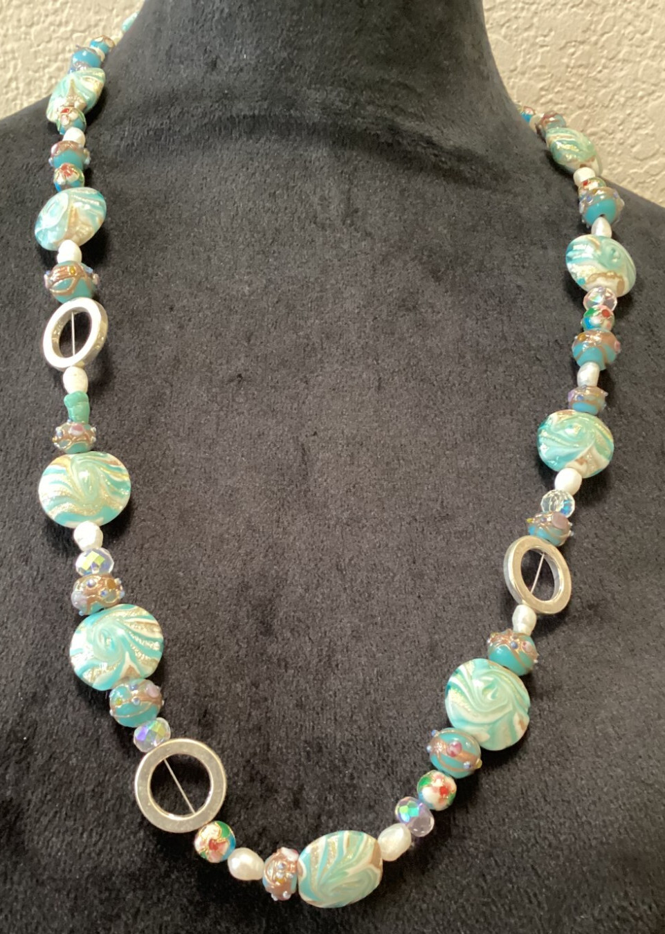 Turquoise bead necklace with crystal and cloisonnee beads and freshwater pearls.