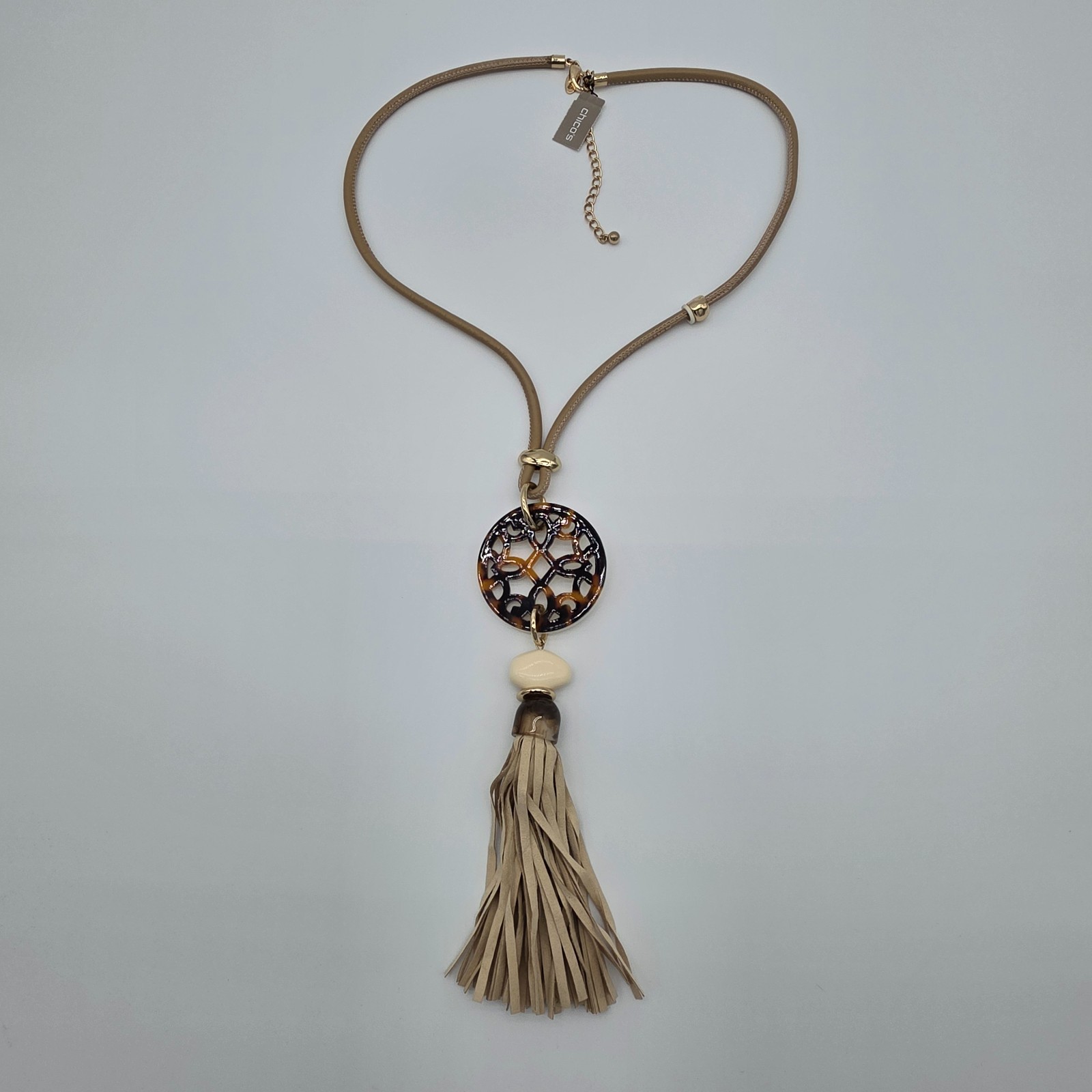 Chico’s long tan faux leather pendant necklace with tassel NWT. Boho
