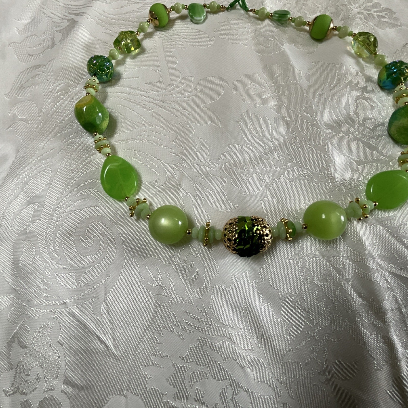 Green Glass Beaded Statement Necklace with Decorative Shapes, Nature Theme