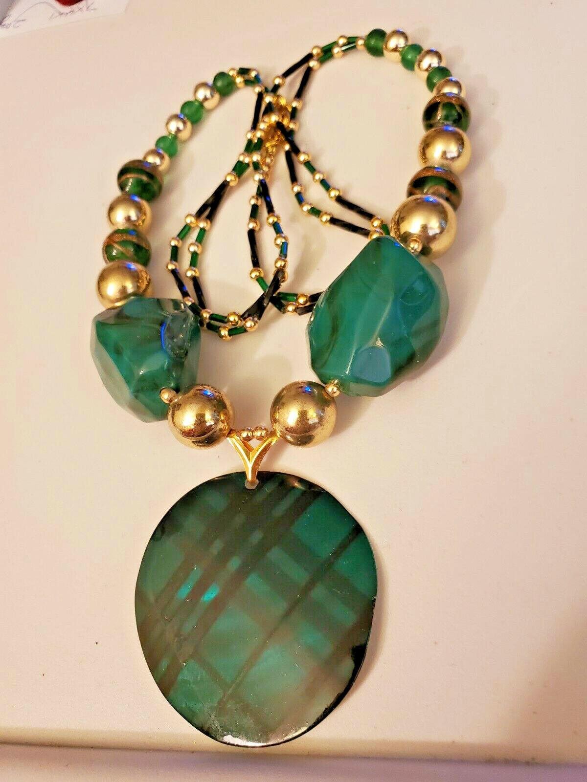 Hand crafted dark green & gold & black accent necklace shell pendant 25″ ceramic