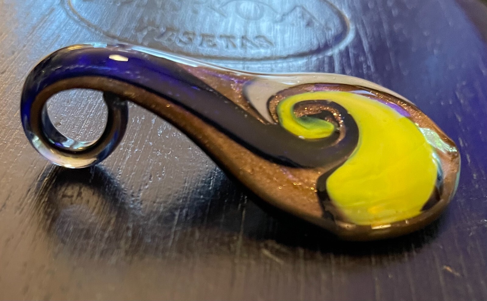 art glass swirl pendant lime green, white, and black swirl on copper metallic
