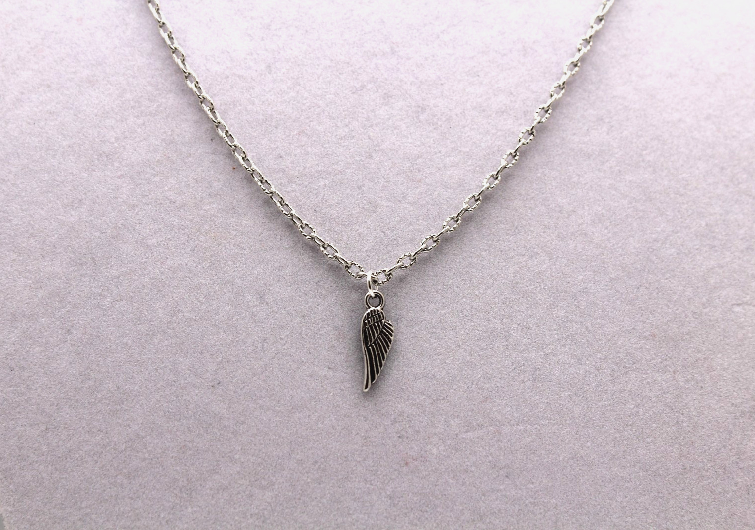 Handcrafted 21″ silver chain with angel wing charm necklace