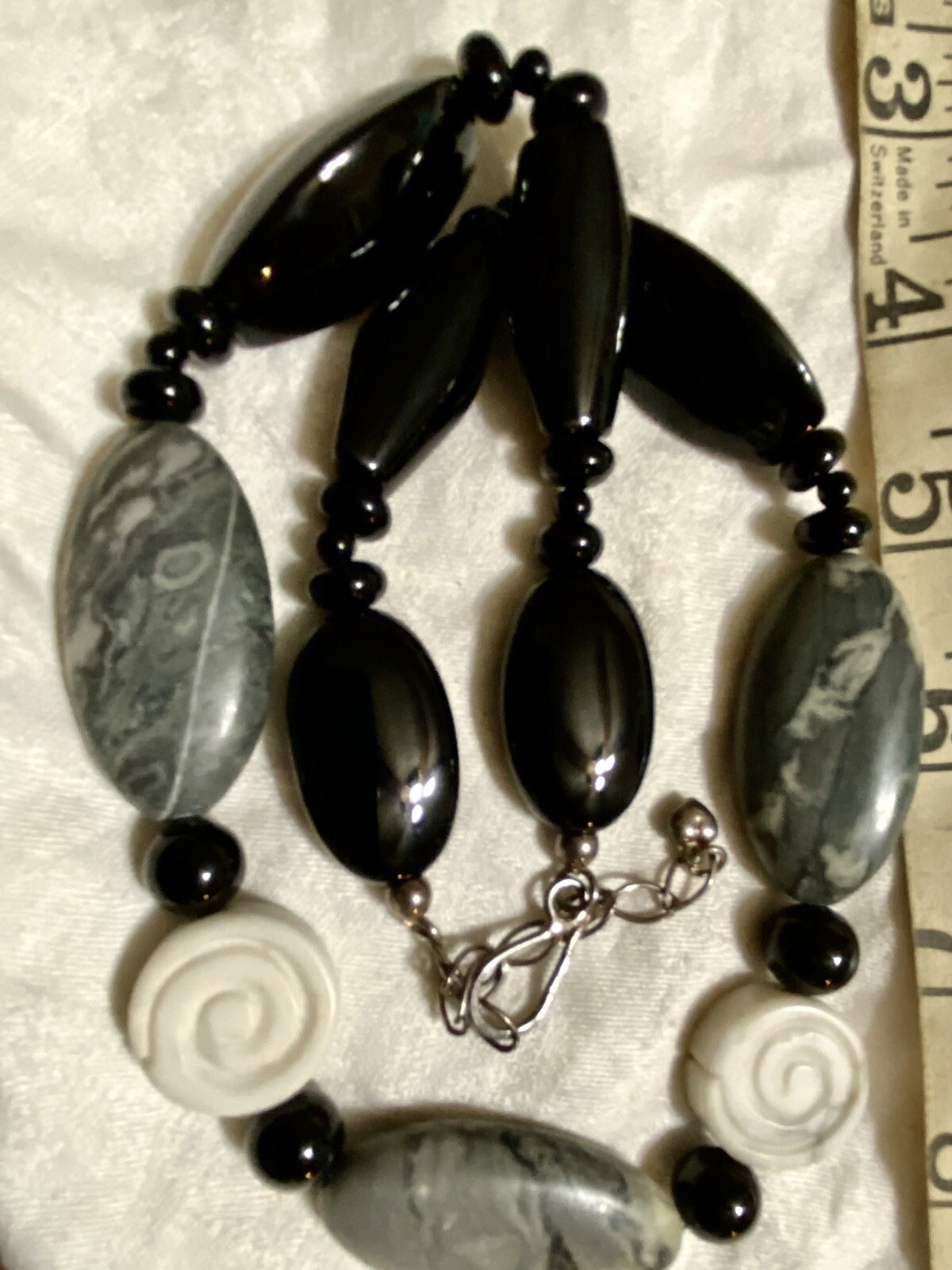 Fashion Artisan Necklace of Picasso Jasper Carved Howlite and Onyx – Classy Fun