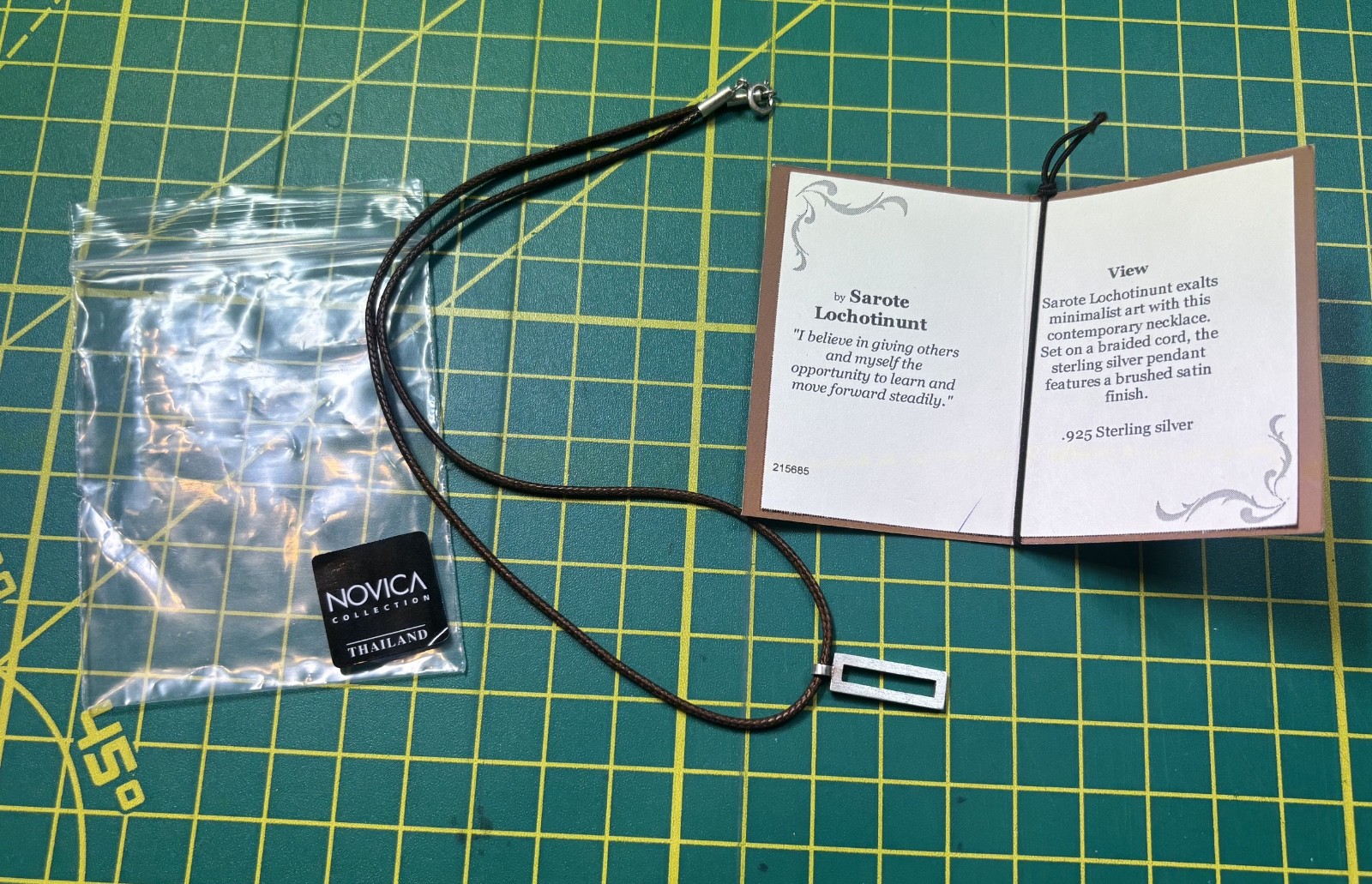Necklace with braided cord and sterling sliver pendant, 18″, artisan made