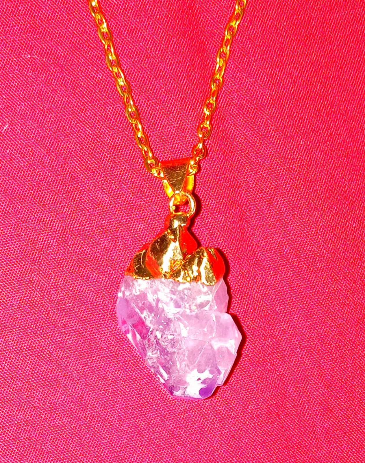 Natural amethyst crystal pendant, gold dipped pendant, on a 22″ goldplated chain